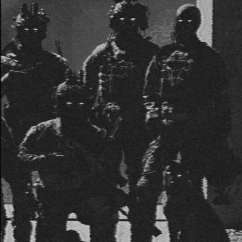 Heavily filtered photo of soldiers with night-vision equipment